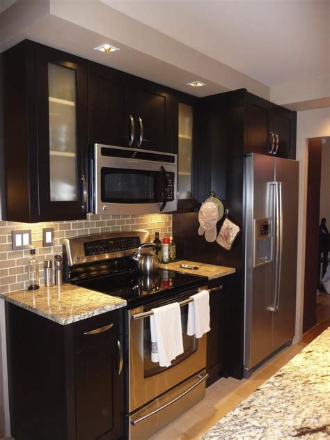 espresso cabinets with stainless steel appliances|backsplash for espresso cabinets.